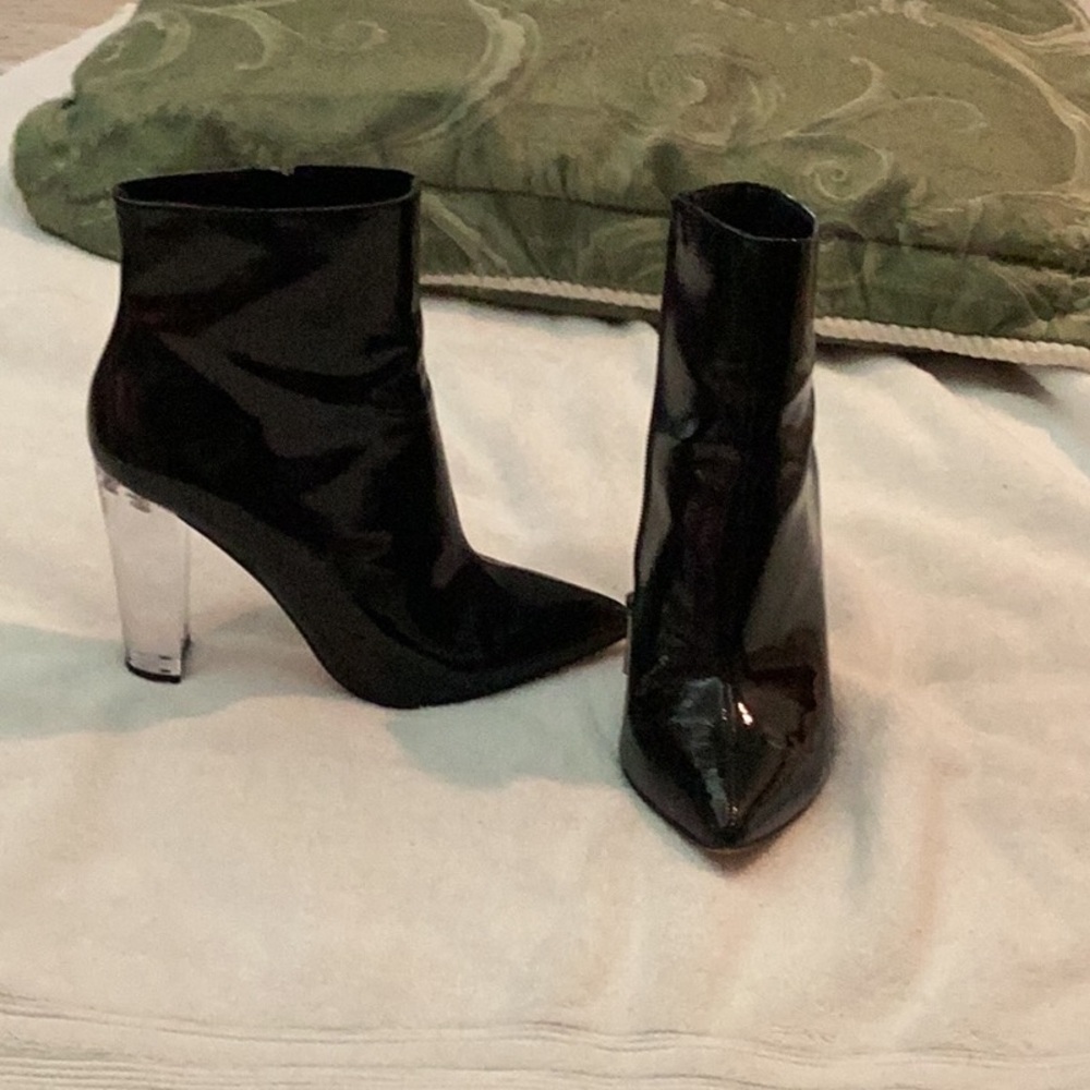 Black patent leather booties with lucite heel